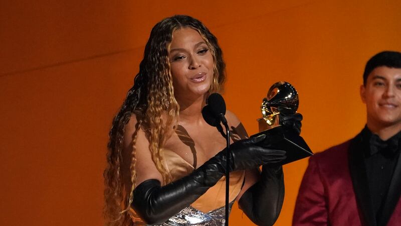 FILE - Beyonce accepts the award for best dance/electronic music album for "Renaissance" at...