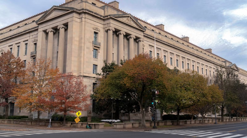 FILE - The U.S. Department of Justice building is seen in Washington, Dec. 7, 2024. (AP...