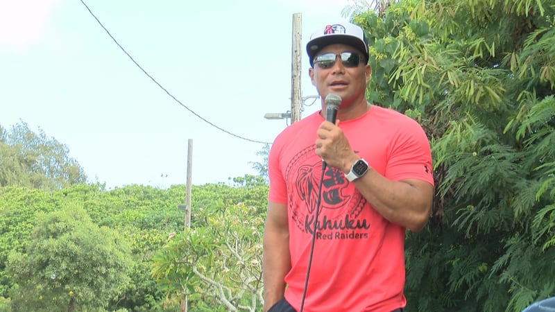 A rally was held Saturday morning in support of the former head football coach at Kahuku High...
