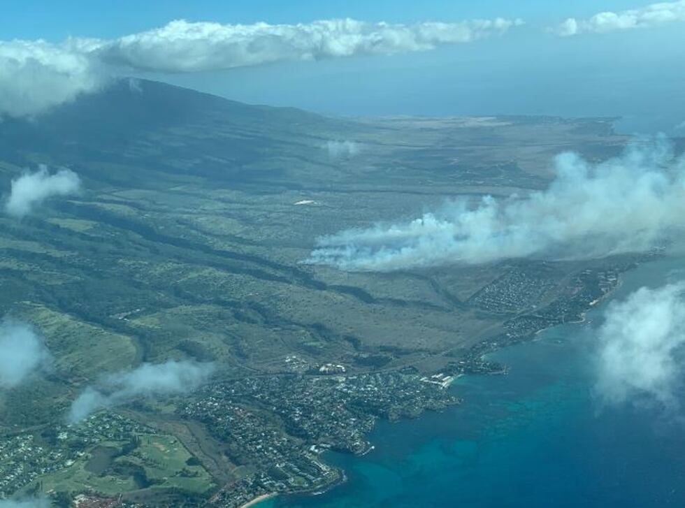 Smoke from a large Maui brush fire can be seen from the air.