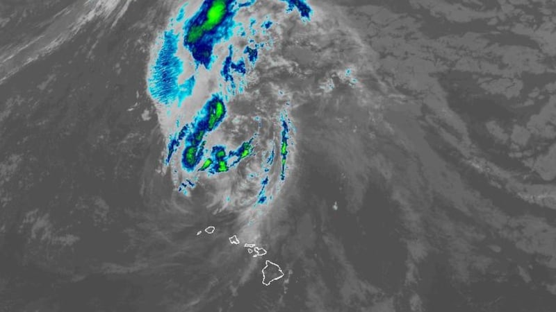 Satellite image shows Hurricane Lowell weakening as it pulls northward away from Hawaii.