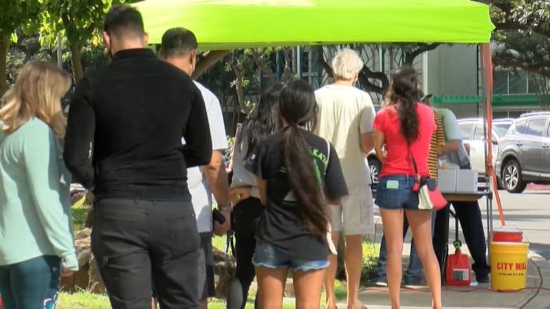 As Hawaii sees record number of COVID cases, many line up at testing sites before celebrating...