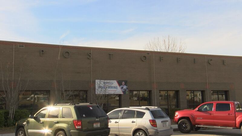 A Georgia postal worker is recovering in the hospital after a dog attack.