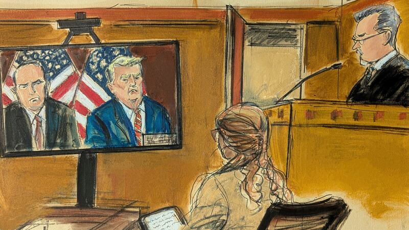 Judge Juan Merchan, right, sentences President-elect Donald Trump, who appeared remotely via...