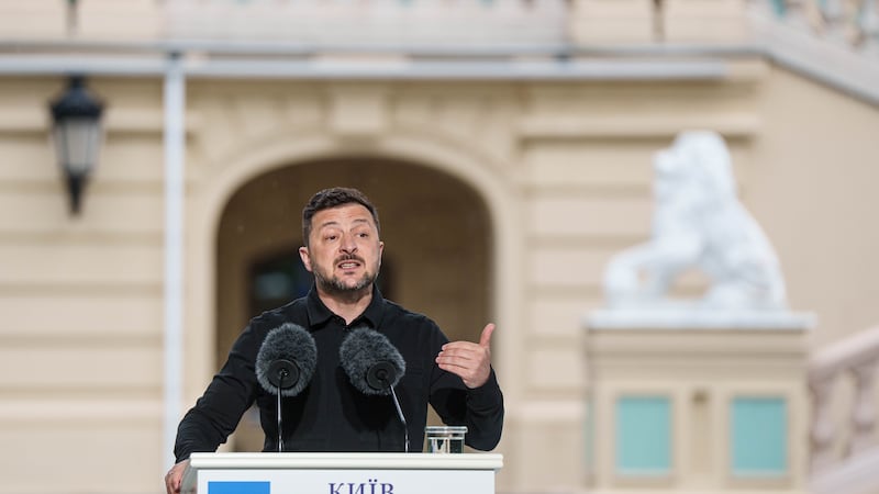 Ukraine's President Volodymyr Zelenskyy speaks to journalists during a joint press conference...