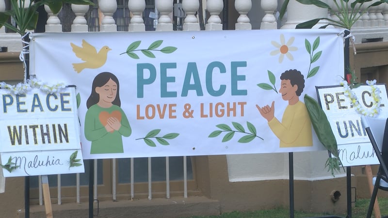 By song and with speeches, grassroots organizers promoted peace on the lawn of Iolani Palace...