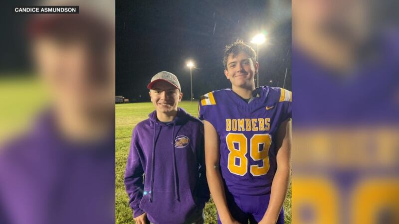 A pair of teenagers are being honored for helping save a woman while out snowmobiling.