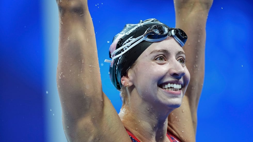 Kate Douglass, of the United States, celebrates after winning the women's 200-meter...