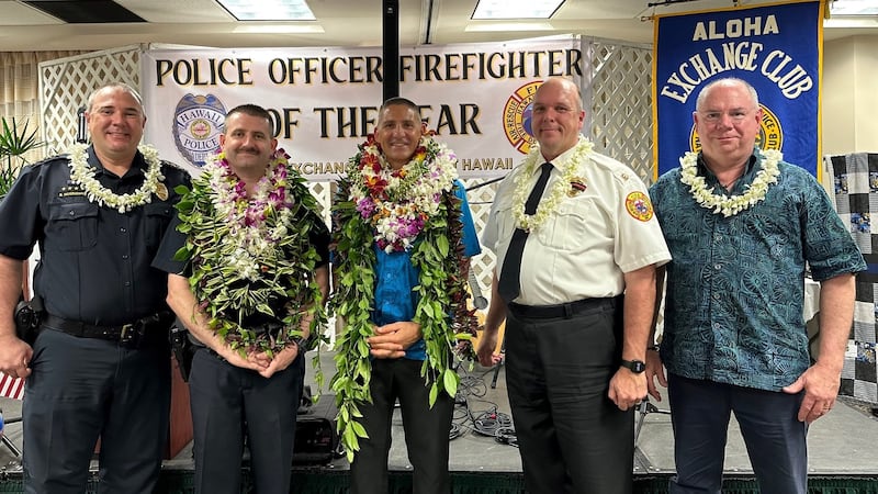 Pictured from left to right: Hawai‘i Police Chief Benjamin Moszkowicz, Officer Michael Sailer,...