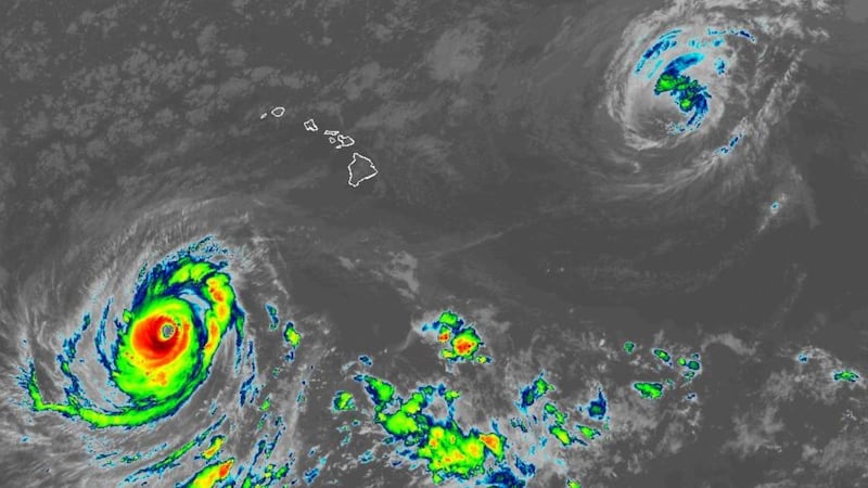 Satellite image of tropical cyclones Lowell (lower left) and Karina.