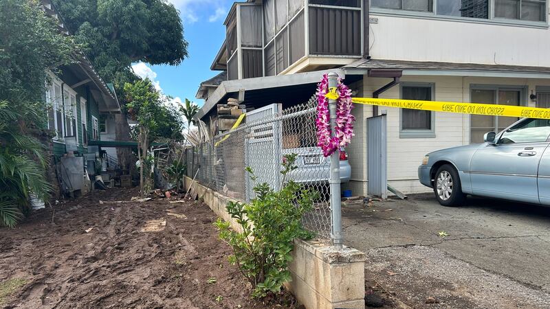 A small memorial was set up at the site of the fire Tuesday.