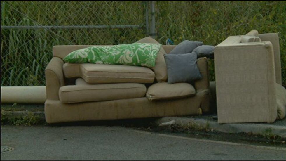 UH neighbors discarded furniture ruined by smoke from the fire.