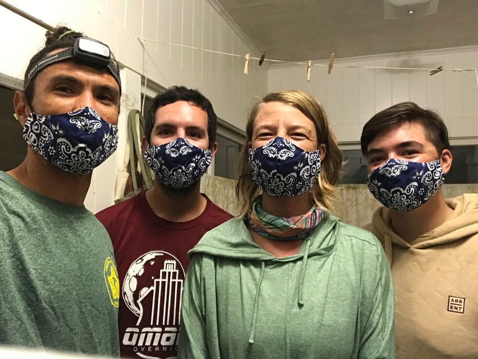 In this Nov. 4, 2020, photo provided by Matt Saunter, Saunter, left, Matt Butschek II, second...