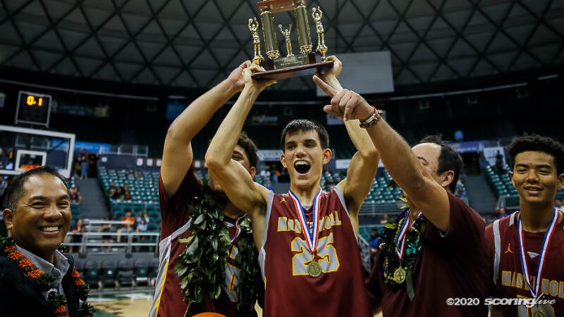 Nikolas Robben and the Spartans hoist the state title for the second consecutive year...