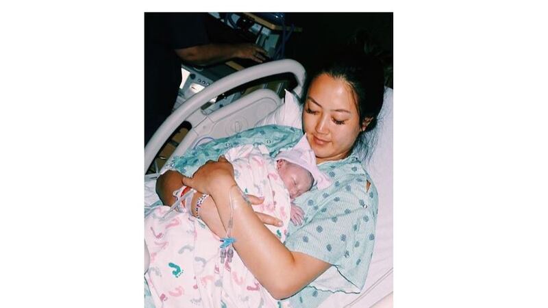 Michelle Wie gave birth to a baby girl Friday night.