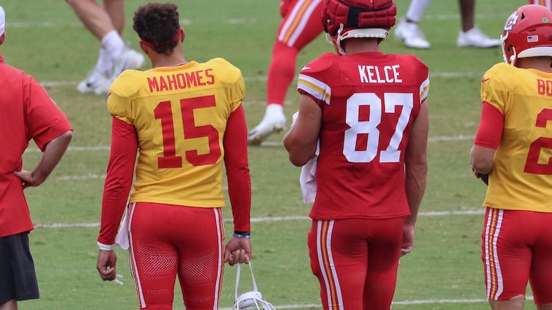 Kansas City Chiefs quarterback Patrick Mahomes and tight end Travis Kelce at a training camp...