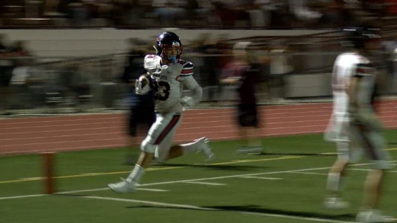 Crusaders receiver Koali Nishigaya runs into the endzone during first quarter of game against...
