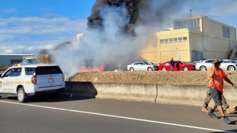 Smoke and flames are visible from Aolele Street