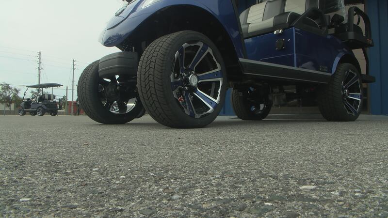 FILE -- The collision threw the girl and her 14-year-old passenger out of the golf cart.