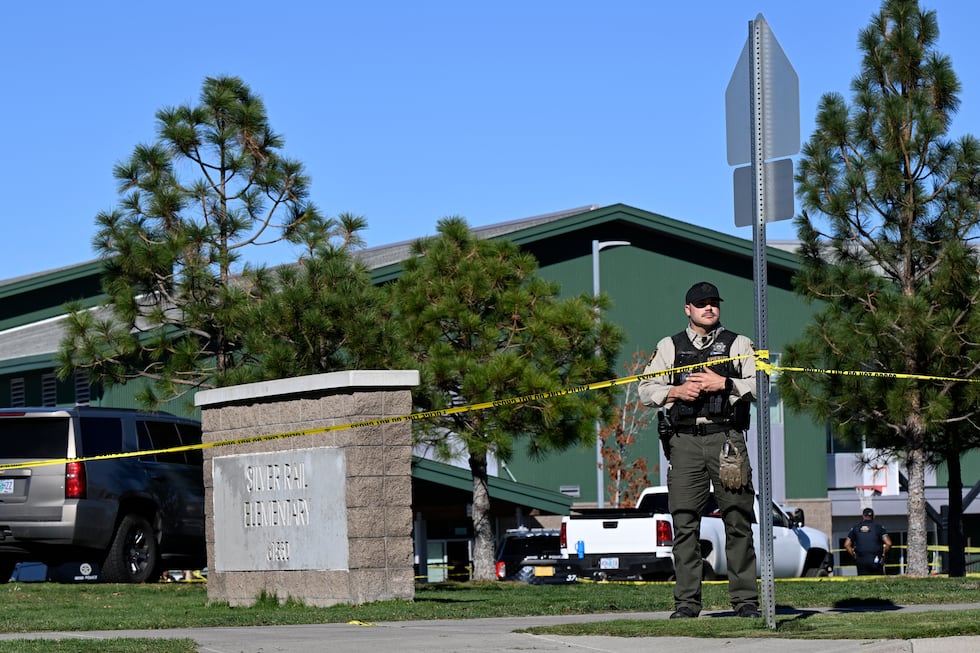 Police tape is placed outside Silver Rail Elementary school, where a shooting took place, on...