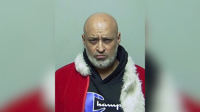 Neil Champagne was arrested for allegedly stalking and harassing his neighbor.