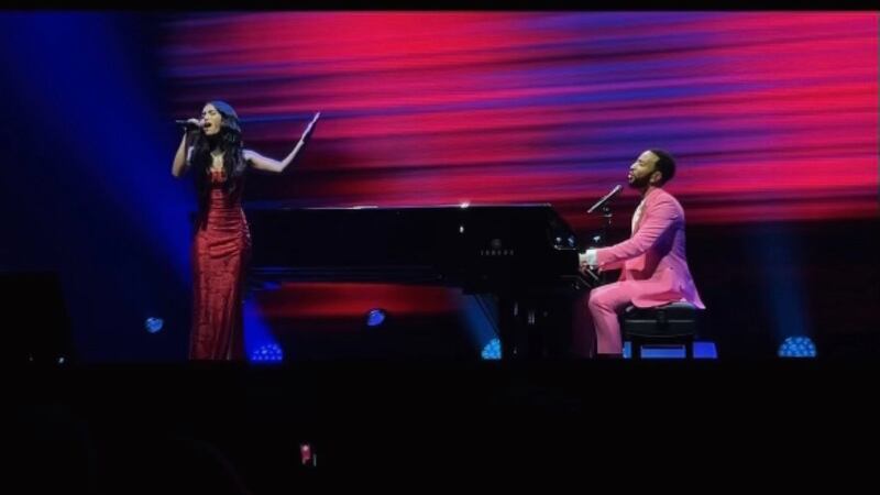 Kaylee Shimizu and John Legend take the stage at the Blaisdell Arena in Honolulu, Hawaii on...