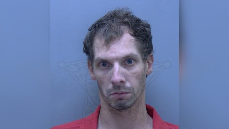 Phillip Mark Zmijewski is accused of threatening a woman with a machete.