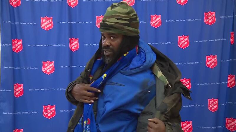 A Salvation Army bell ringer was back on duty at the red kettle after being wounded by a stray...
