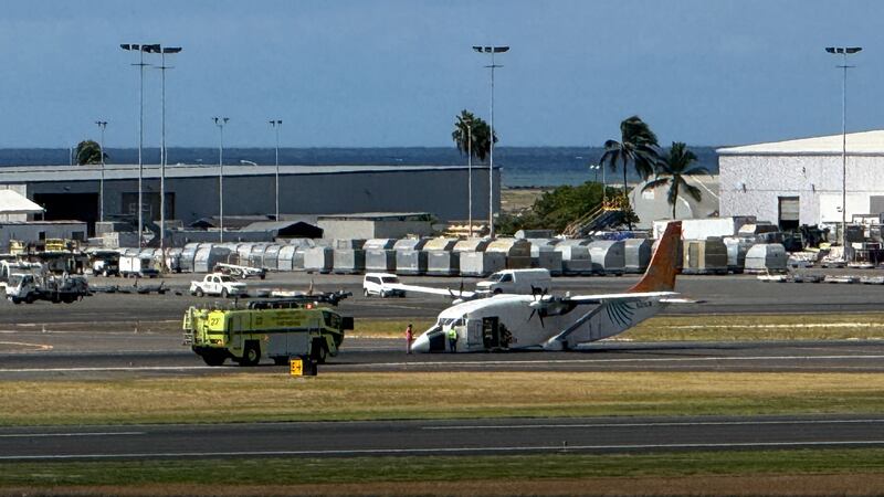 The landing gear of the Short SD3-60 aircraft collapsed upon landing in Honolulu Wednesday...