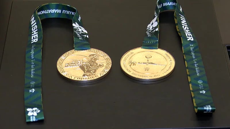 This year, Honolulu Marathon's top finishers get more than prize money ... they get real gold