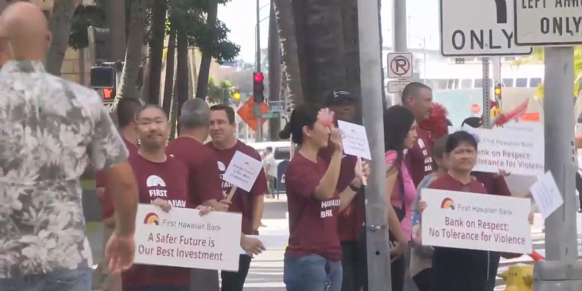 Domestic Violence Awareness Month launches with community sign-waving