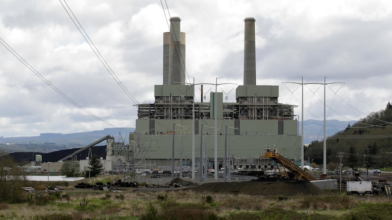 FILE - The coal-burning TransAlta power plant is shown near Centralia, Wash., April 29, 2011.