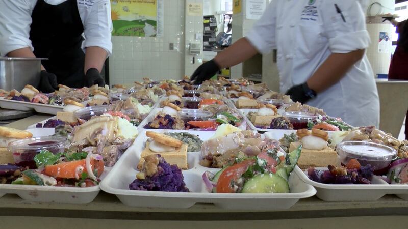 Grateful and hungry, people lined up outside the cafeteria waiting to be let in.