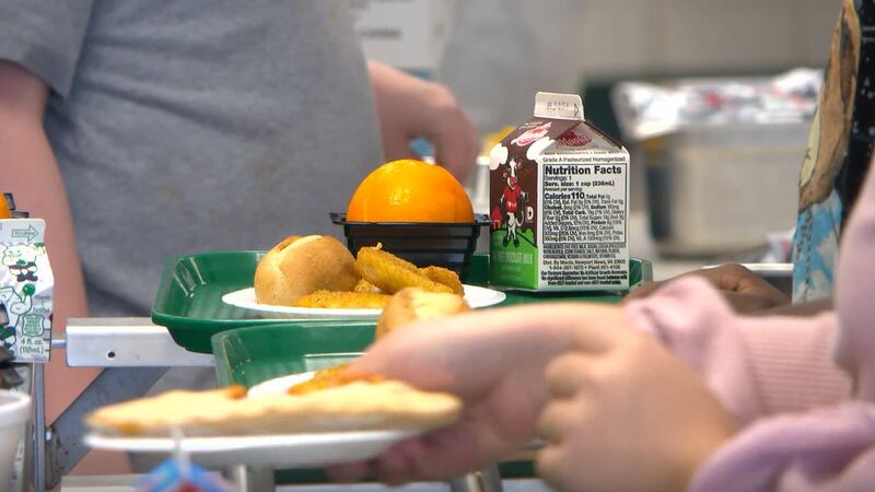 FILE -- An Ohio family used their annual holiday party to collect funds to help pay off...