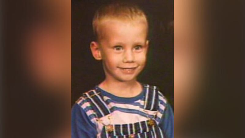 The father and stepmother of Justin Lee Turner have been charged with his 1989 murder.