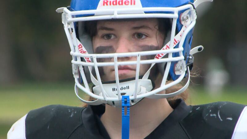 8th grader Jo Schmidt is blazing a trail as the starting quarterback for the Sullivan Middle...