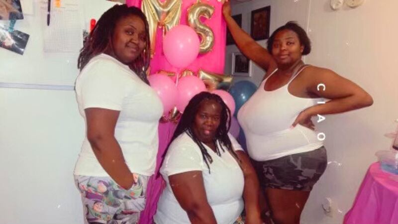 Left to right: Wynshay Roddey, Qaunique Robinson and Danesha Sims celebrate a birthday. Family...