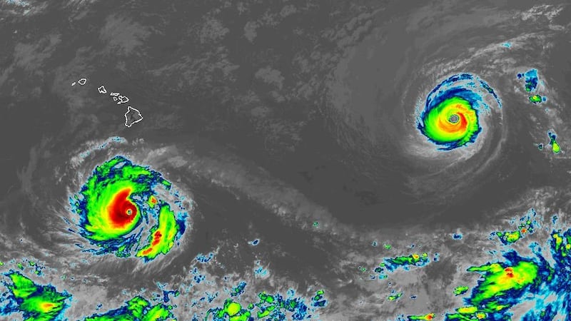 Satellite image of major hurricanes Lowell (L) and Karina.