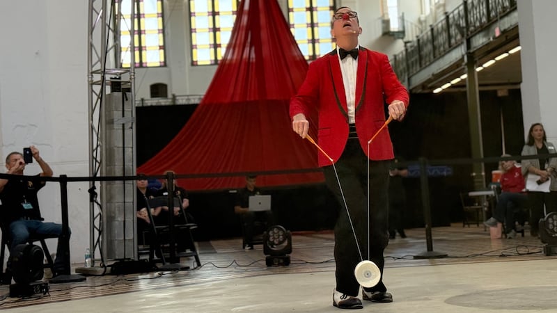 A performer from the Circus Arts Conservatory performing in a dress rehearsal at the...