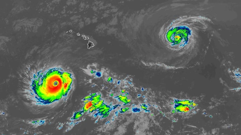 Satellite image of hurricanes Lowell (lower left) and Karina.