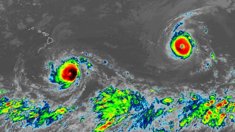 Major hurricanes Lowell (left) and Karina.
