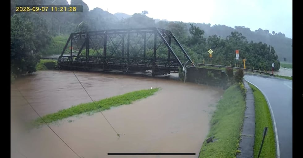Flooding and high stream levels keep Kūhiō Highway closed at Hanalei Bridge, blocking traffic...