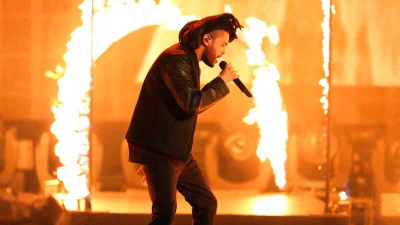 FILE - In this Sunday, Nov. 22, 2015, file photo, the Weeknd performs at the American Music...