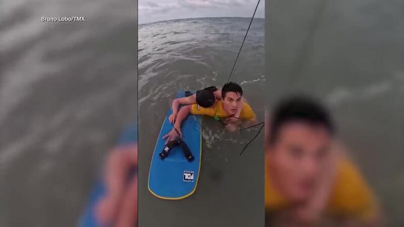 An Olympic kite surfer on a practice run saved a woman who was pulled out to sea. (CNN, BRUNO...