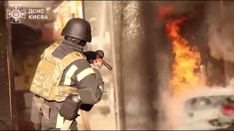 Firefighters battle blazes in Kyiv in the wake of Russian strikes. (Telegram/State Emergency...